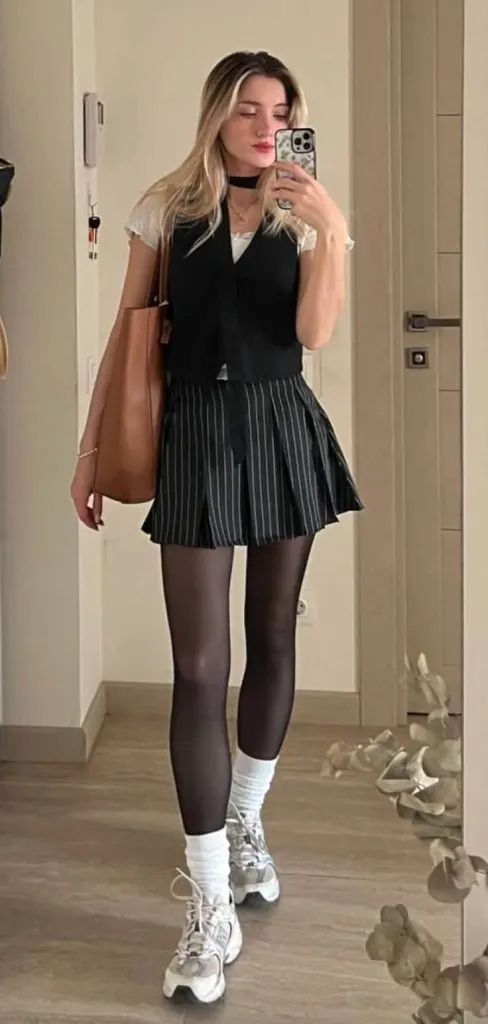 short pleated skirt and tights