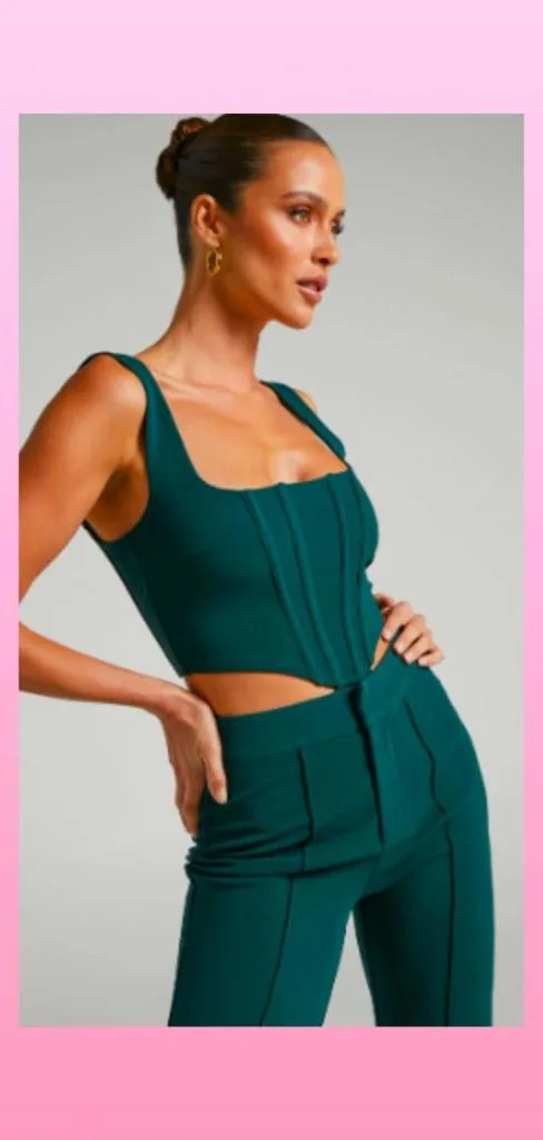 corset top and emerald green pants